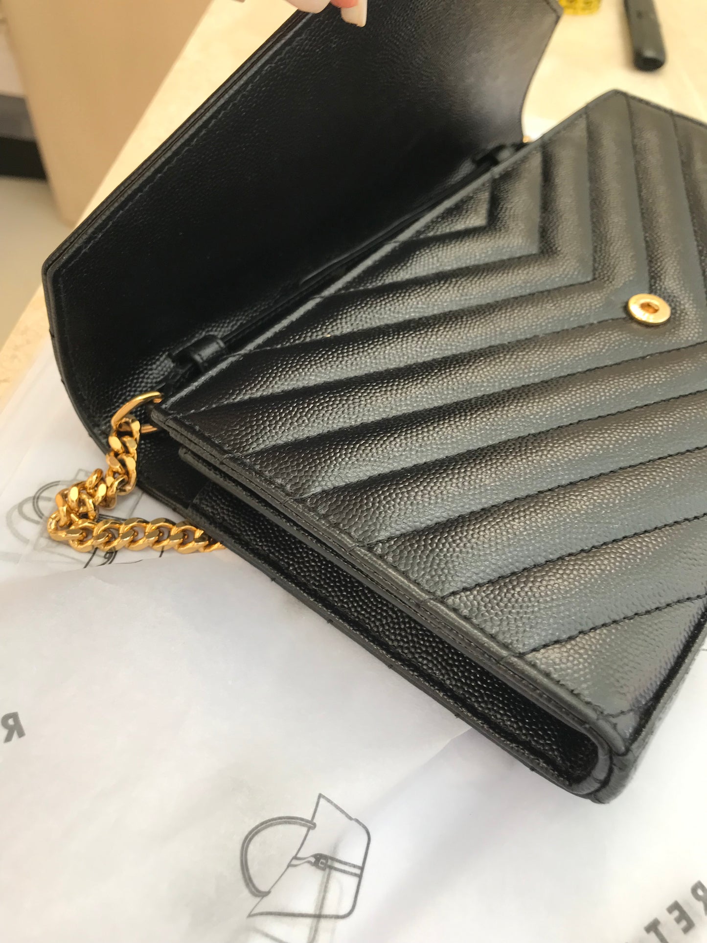 Saint Laurent Pochette con Catena Cassandre